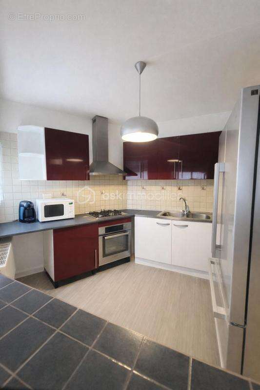 Appartement avec stationnement privé et box en cave - photo 4