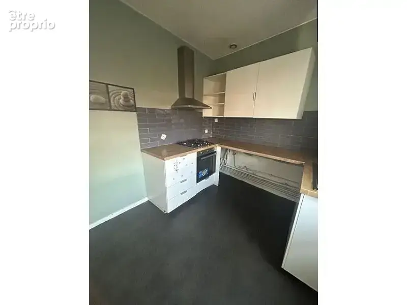 Appartement 4 pièces 85 m² à vendre à Le Chambon-Feugerolles (42500) - photo 2