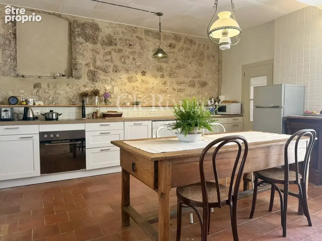 Au cœur d’Eymet – Maison de caractère avec grange et cour plein sud - photo 2