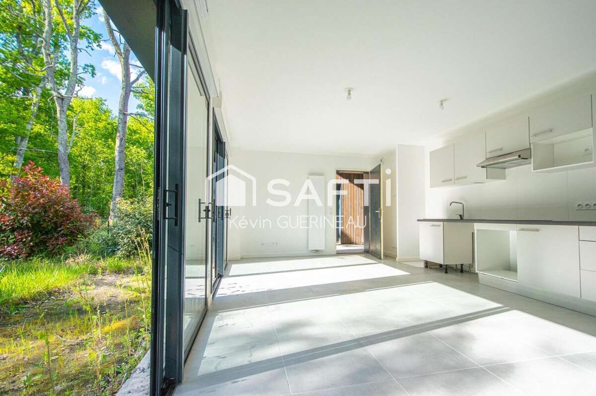 Photo 2 - Maison à LE TAILLAN-MEDOC