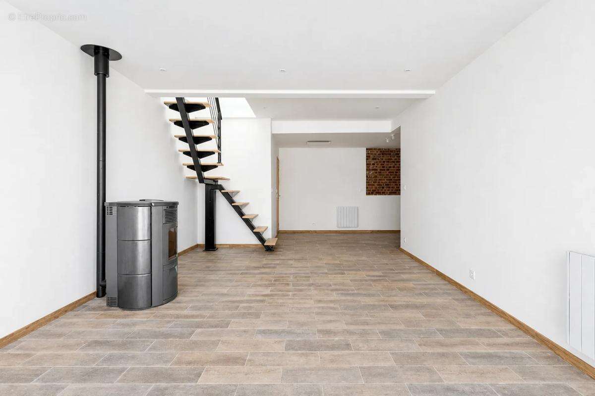 Maison de 4 pièces de 101 m² à Bauvin - photo 5