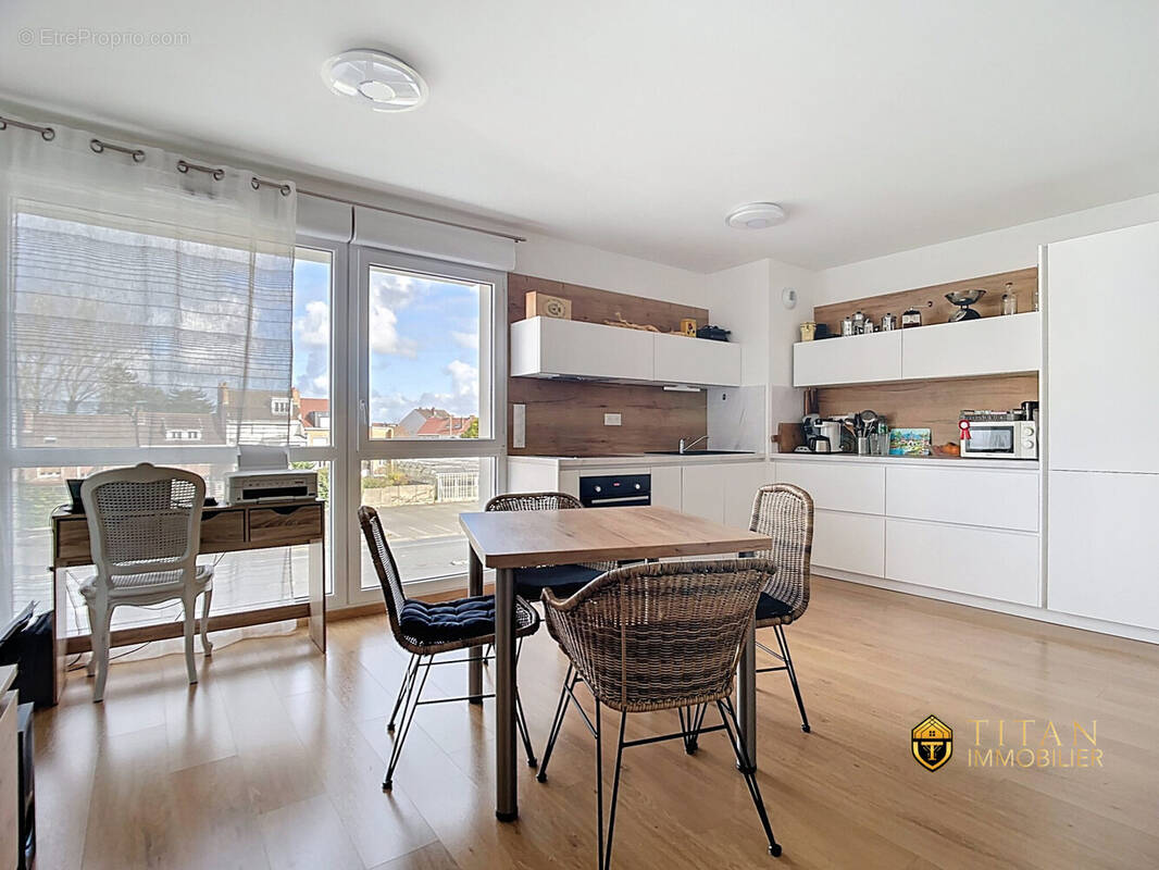 Appartement de 50.11 m² résidence de 2021 avec une chambre, un ascenseur avec une place de parking privée et sécurisée à Leffrincoucke (59495) - Appartement à LEFFRINCKOUCKE