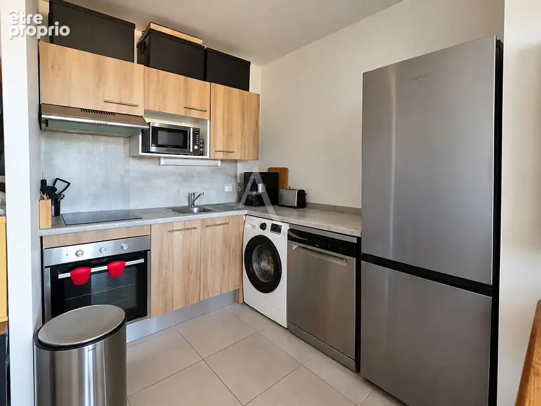 Appartement T2 au dernier étage avec balcon et vue dégagée - photo 3