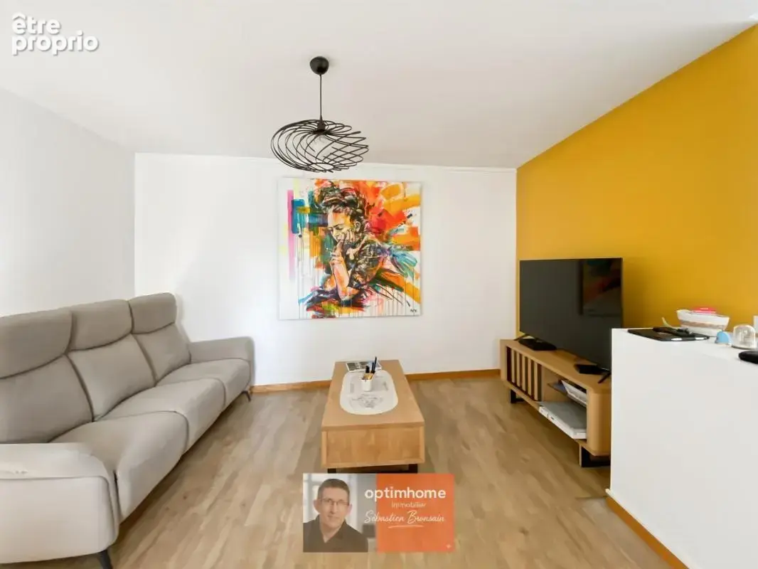 DOLE – Appartement duplex 85 m² – beaux volumes, parking et grande cave - photo 2