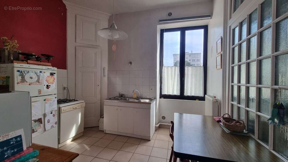Appartement 56 m² à Lyon-8e  - photo 2