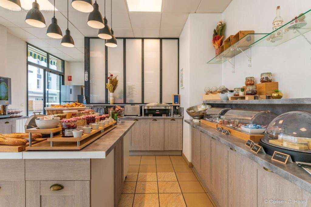 INVESTISSEMENT LOCATIF  Lannion  Résidence  Brit Hotel Confort Lannion Centre Gare  6,53 % de rentabilité - photo 10