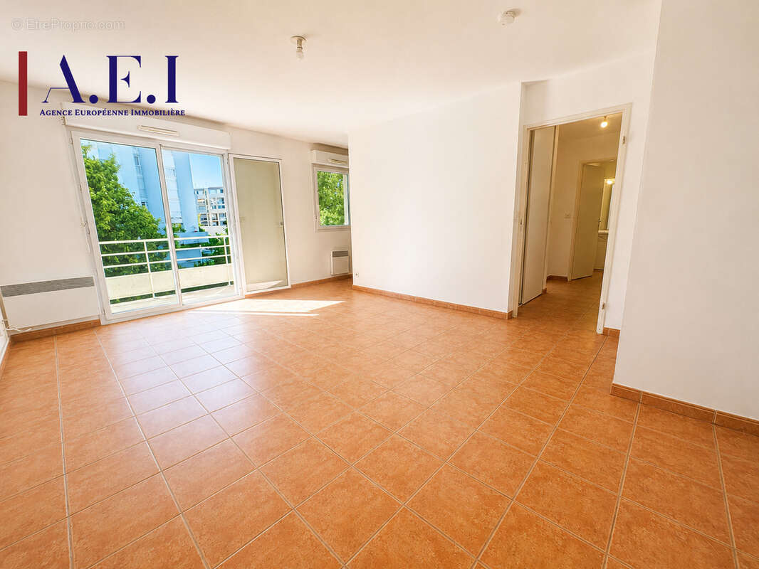 Appartement T2 avec terrasse et stationnement privatif - photo 3