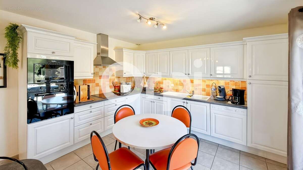 Maison À Vendre sur 1500m² de terrain arboré - photo 9