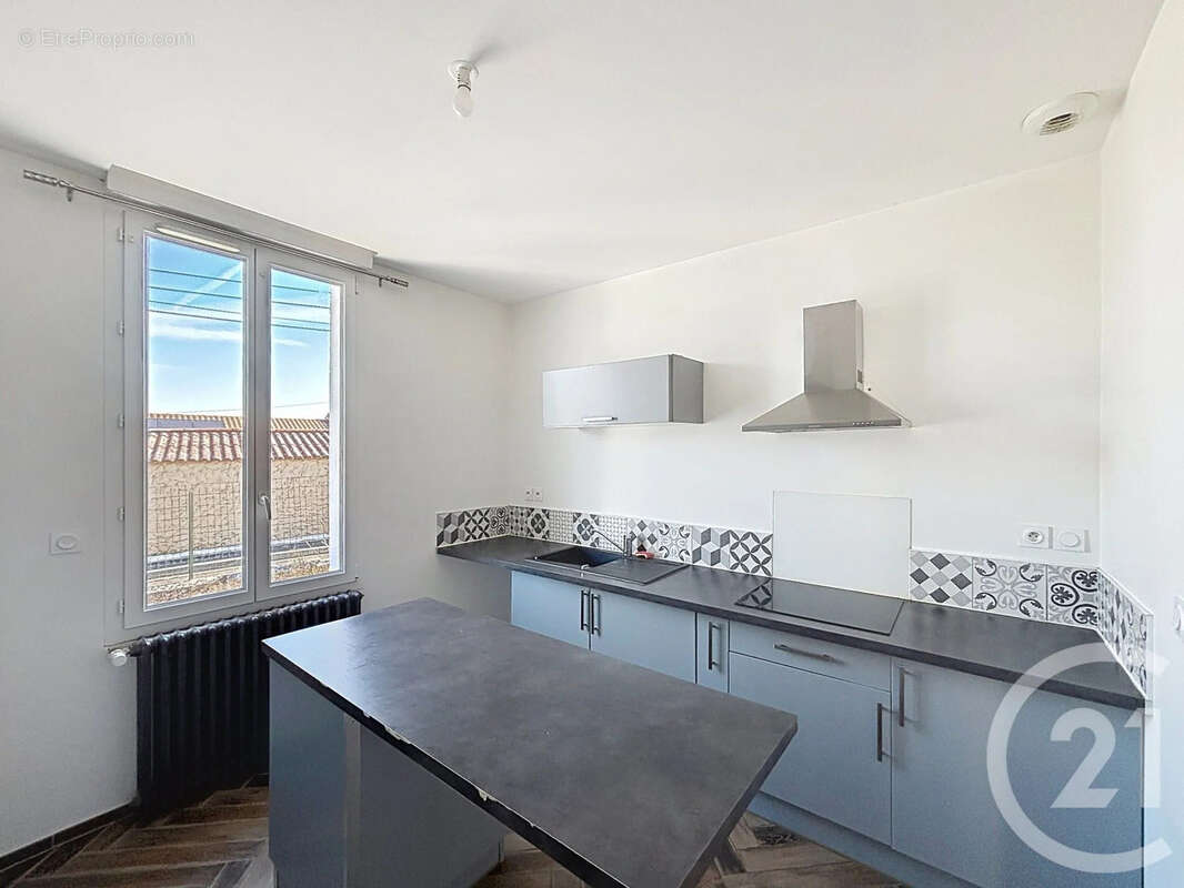 Maison 93 m² à Ruelle-Sur-Touvre  - photo 4