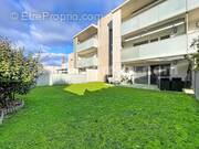 Appartement_T3_Annemasse_Genève_Ceva_tramway_Suisse_investissement_hyper_centre_Séjour_cuisine_terrasse_jardin_ - Appartement à ANNEMASSE