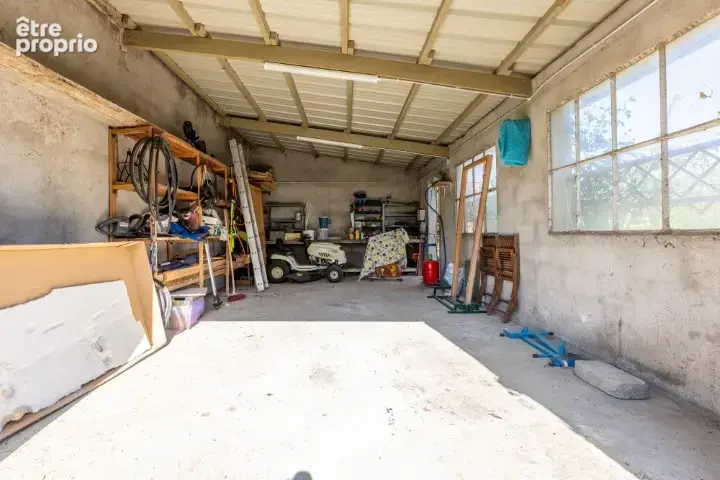 Naves 03330 -maison pierre-terrain- garage-atelier 119 000 euros fai - photo 10