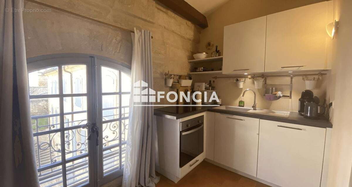 Appartement de Caractère à Uzès Charme et Authenticité au Cœur du Centre Historique d'Uzès - photo 2