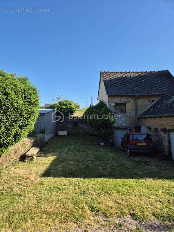 Maison à PLOUASNE