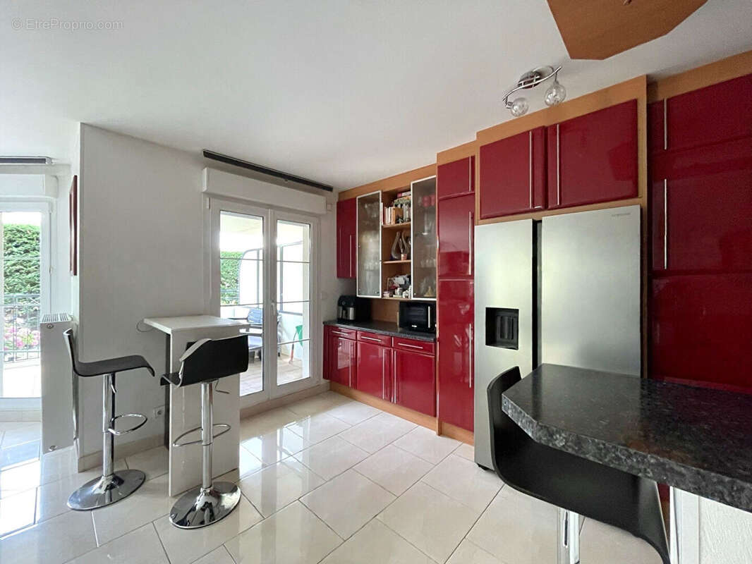 Appartement en rez-de-jardin avec garage, parking, cave, terrasse et jardin - photo 9
