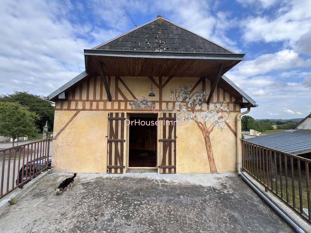 Maison à LE MENIL-DE-BRIOUZE