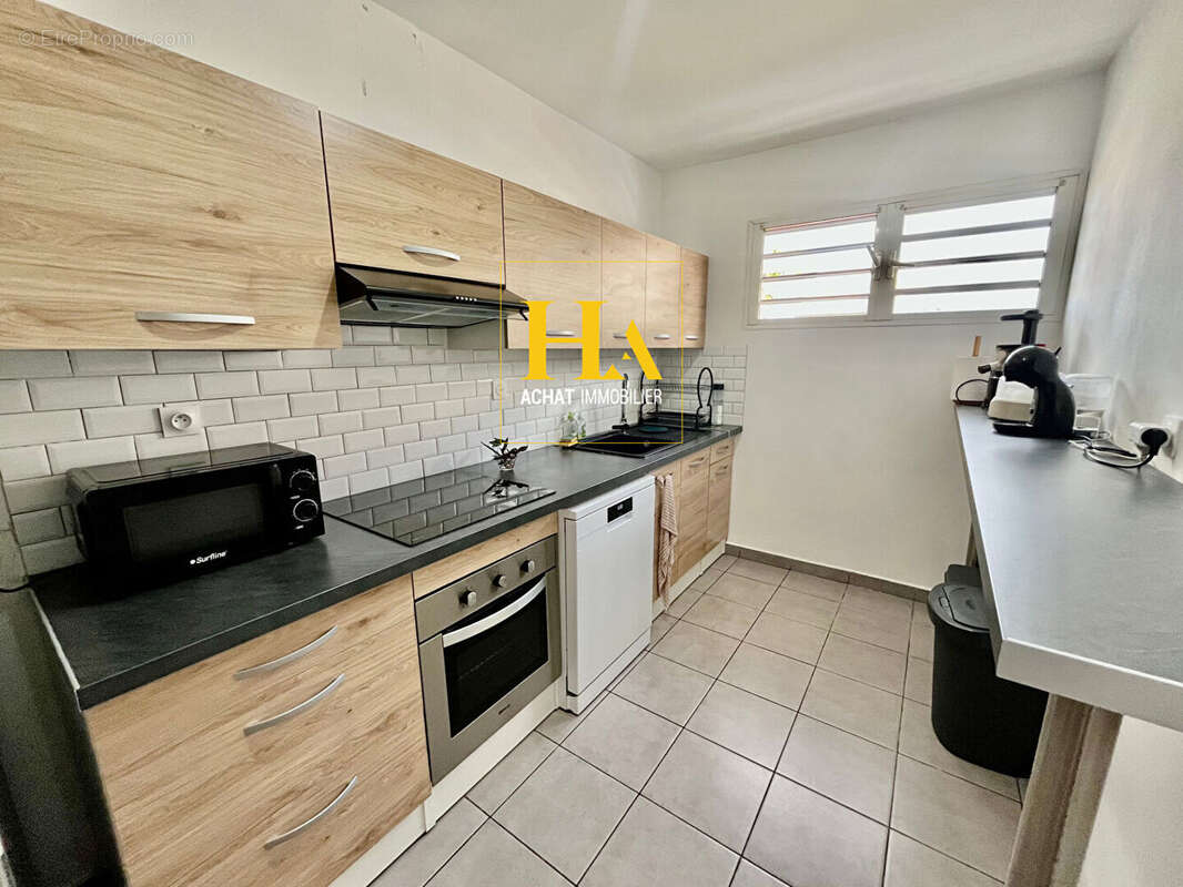 Appartement T3 66 m² Saint Pierre  - Centre Ville - photo 4