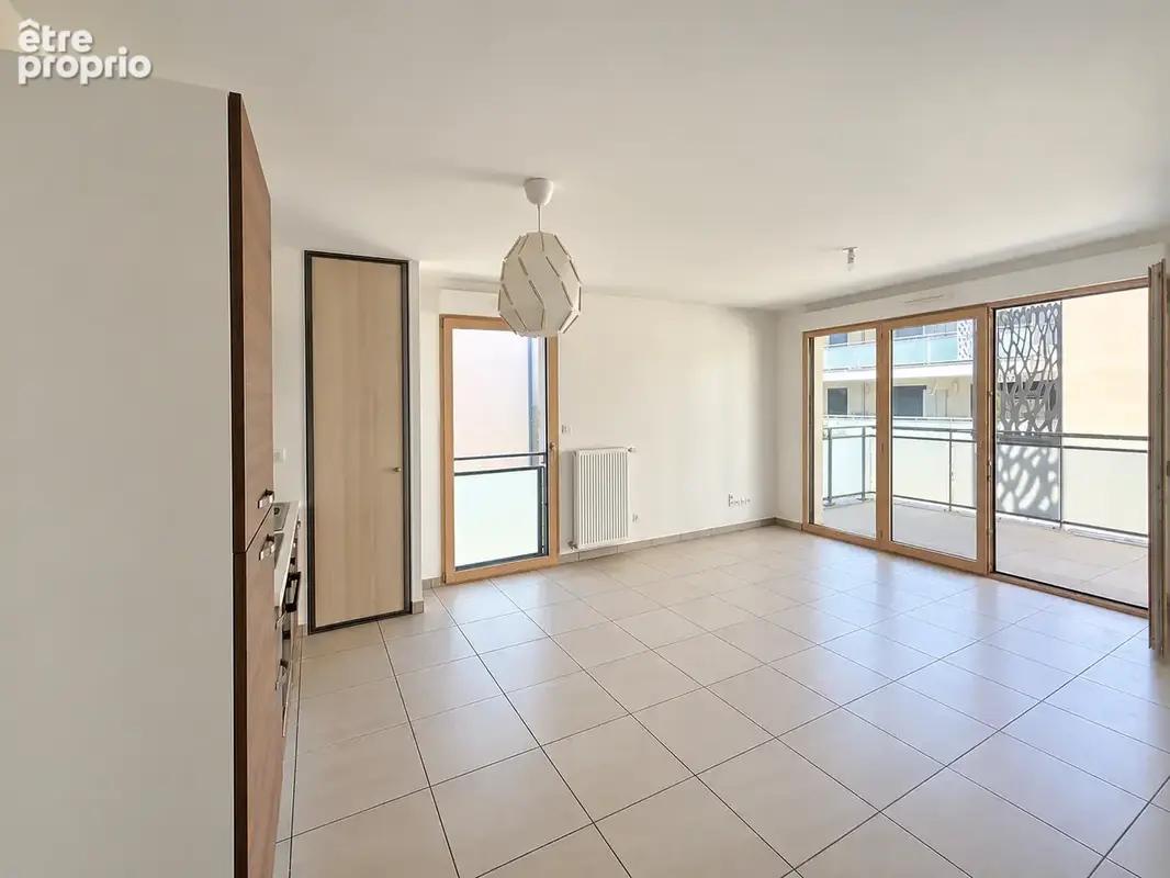 Appartement lumineux avec terrasse et garage Neuville Sur Saône 3 pièce(s) 62m2 - photo 3