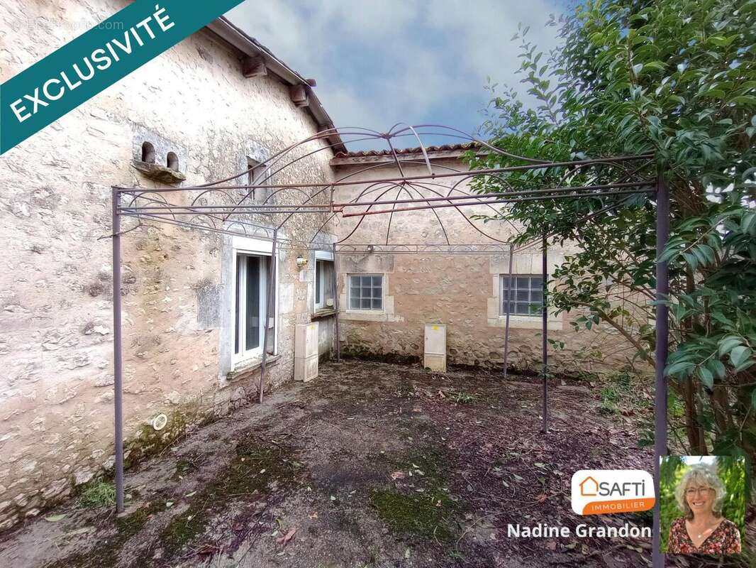 Maison 109 m² à Touverac  - photo 2