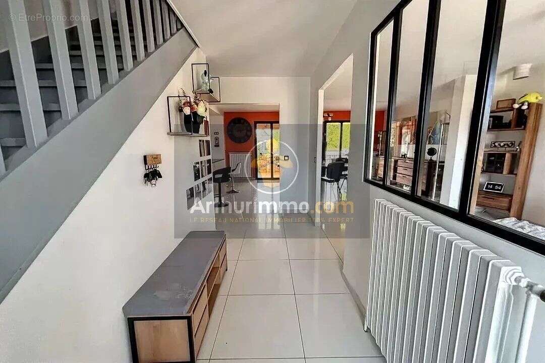 Maison à GUIGNES