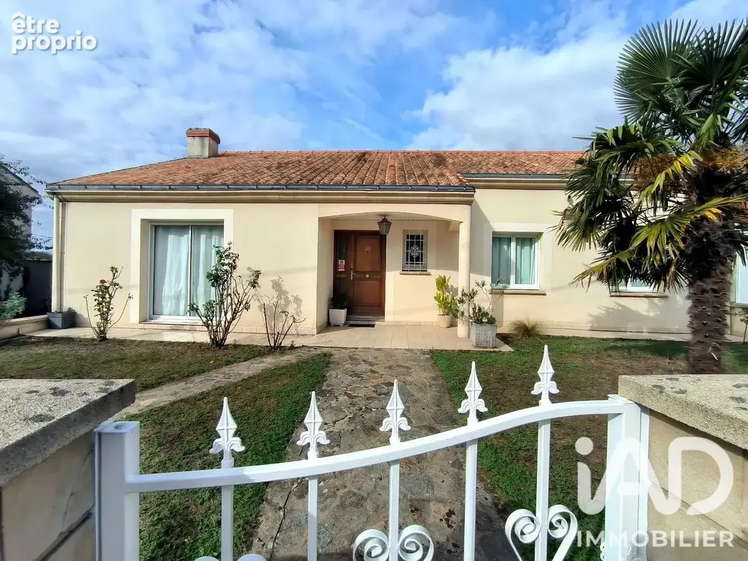 Photo 1 - Maison à BOUGUENAIS
