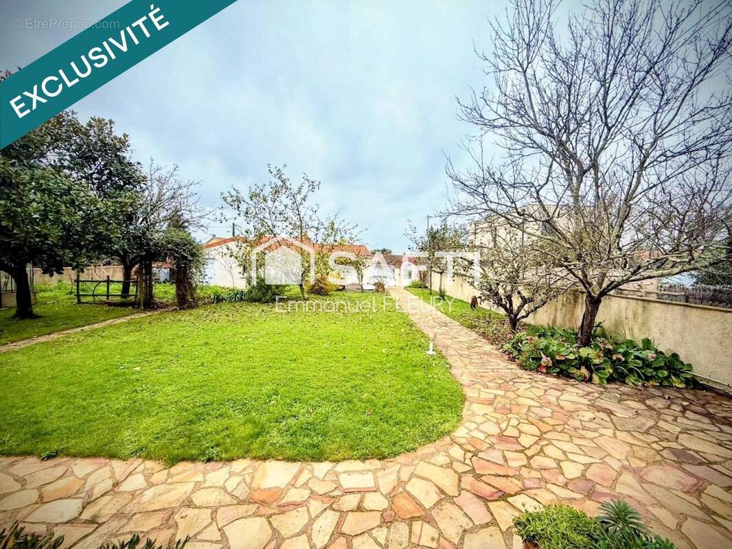 Photo 1 - Maison à BOUGUENAIS