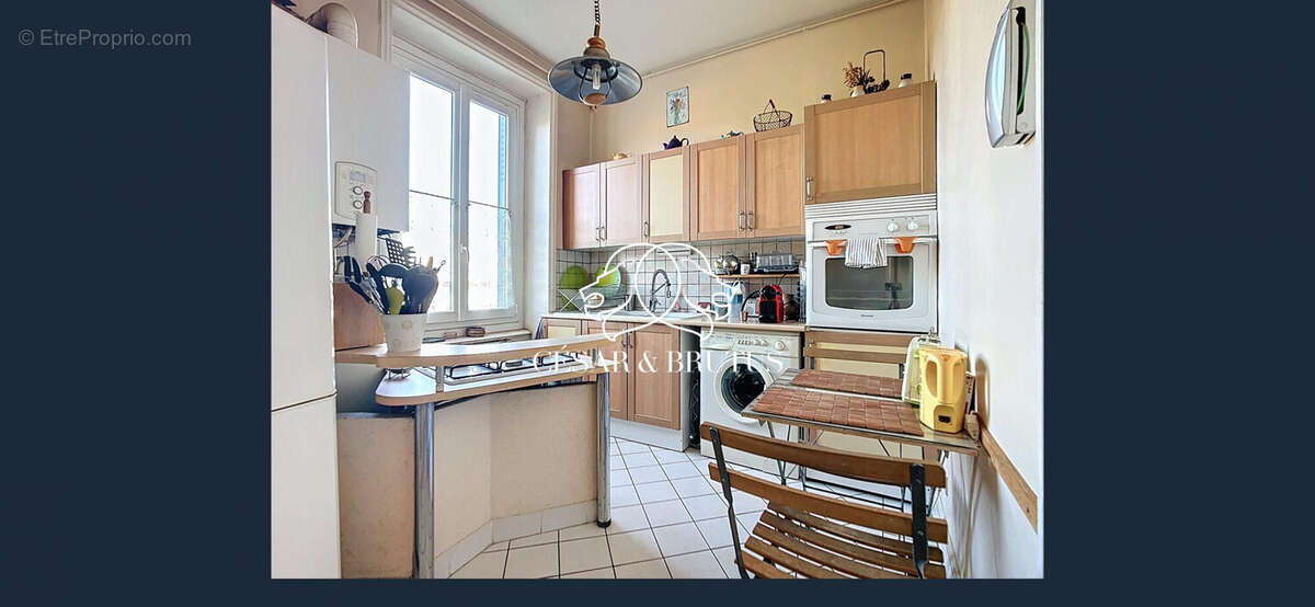 Cuisine - Appartement à VILLEFRANCHE-SUR-SAONE