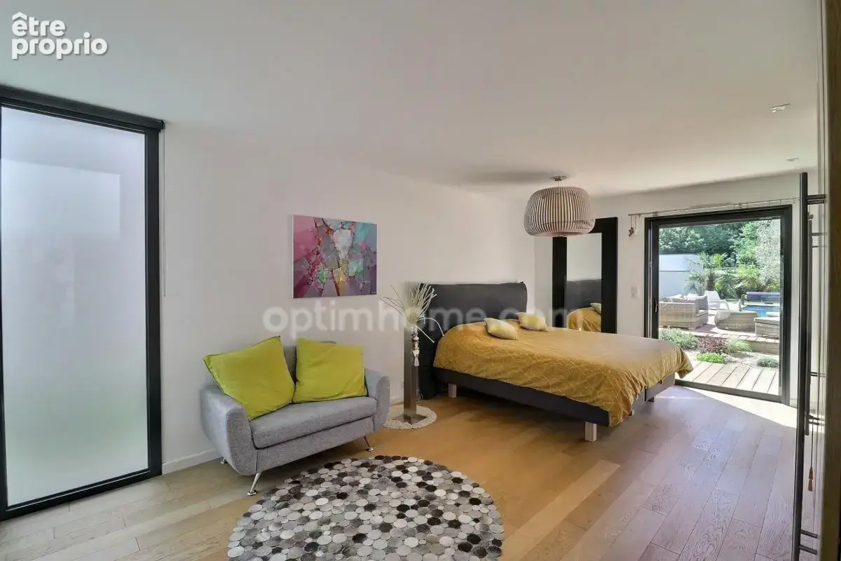 ORVAULT « La Forêt » — Villa d'architecte contemporaine en plain-pied total (197 m²) & piscine chauffée - photo 11