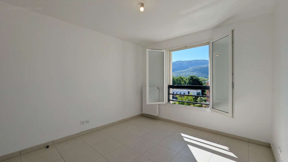 SEYNOD - T3 avec balcon - photo 7