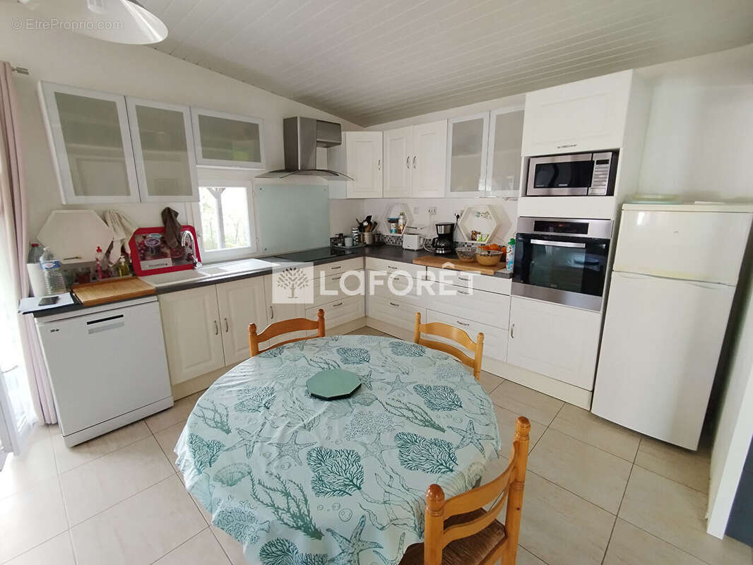 Maison avec 15 Garages Rentables + Terrain Castelmayran - photo 7