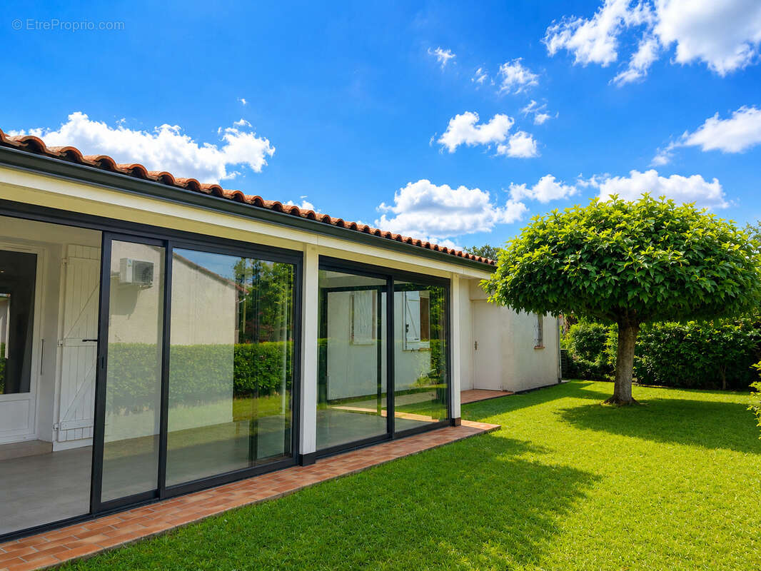 Maison Contemporaine  Plain-pied 93 m2   Véranda de 17 m2   Jardin - Garage   Pins-Justaret - photo 12