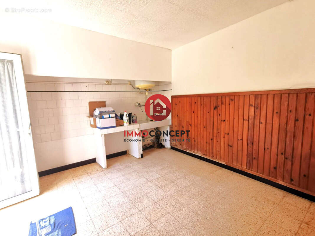 Maison à LAUDUN-L'ARDOISE