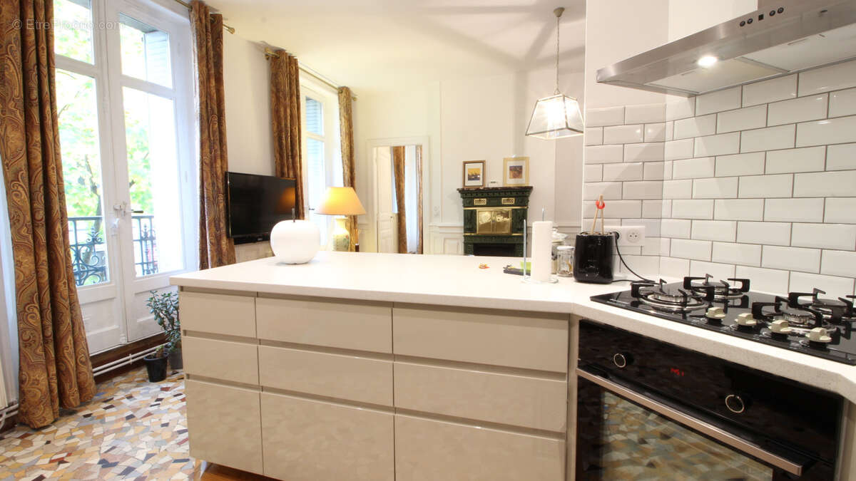Bel appartement T2 avec ascenseur en centre-ville de Vichy avec cave et mansarde - photo 5
