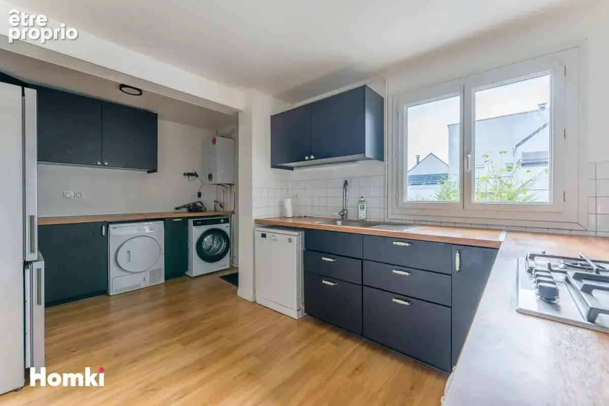 Appartement T4 avec jardin privatif de 58 m² – Un esprit maison à deux pas du centre - photo 5