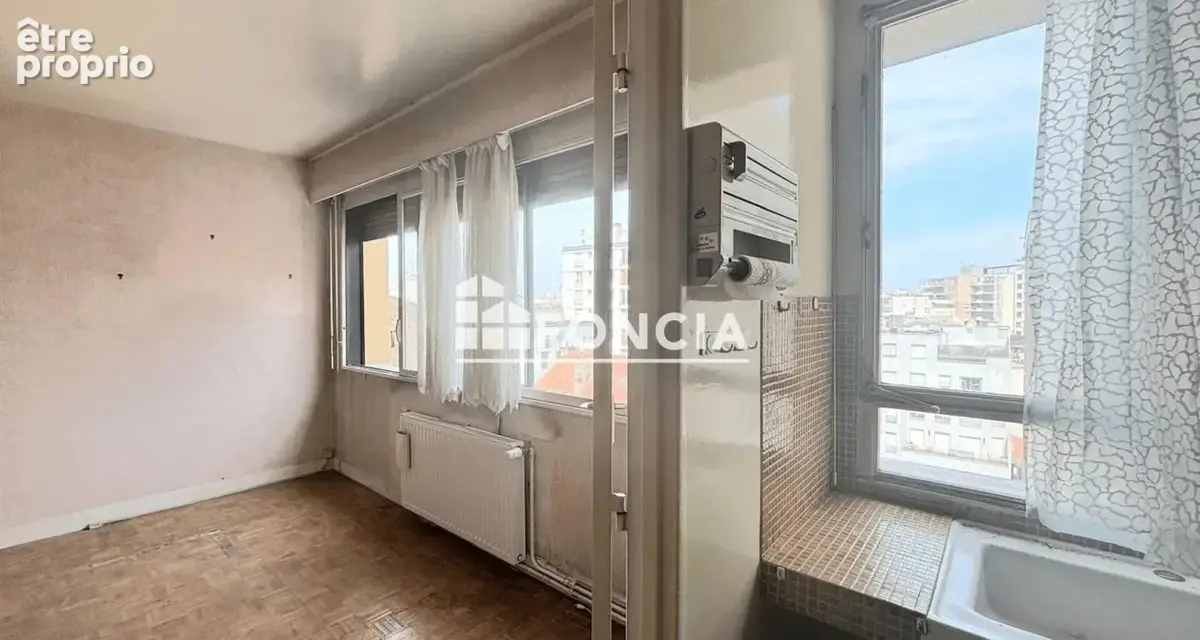 Appartement 2 pièces à moderniser en étage élevé - photo 3