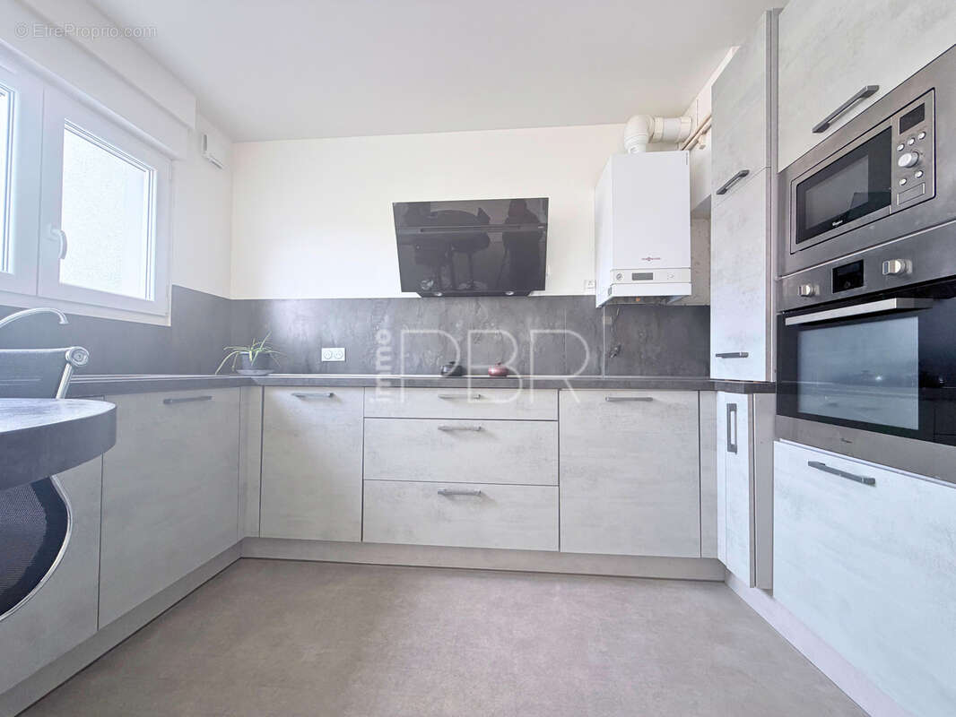 Appartement T3 avec cave - photo 4
