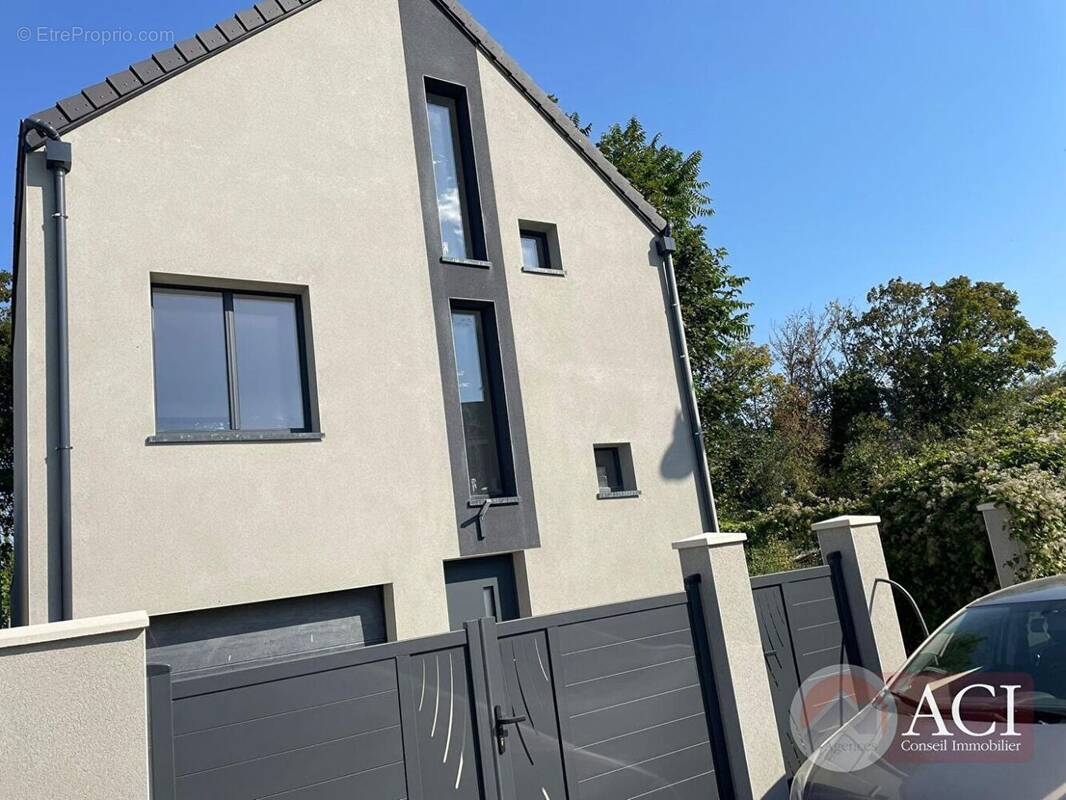 57199274a.jpg - Maison à SAINT-BRICE-SOUS-FORET