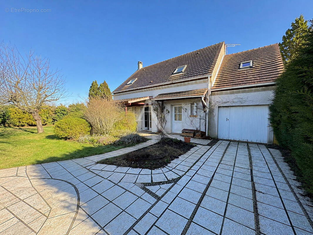 Maison à US