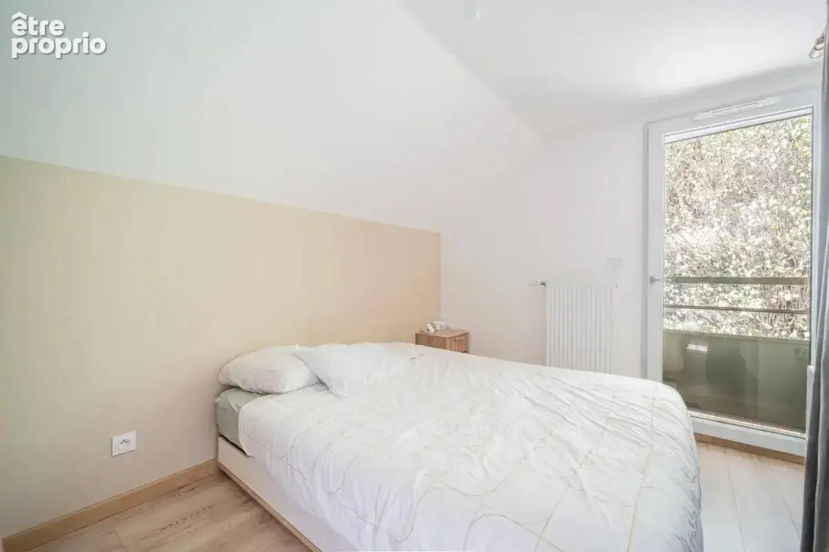 Référence : 7441-TCA. - Appartement 3 pièces - Duplex - Terrasse - Cave - 2 places de parking à Bromines (74330 Sillingy) - photo 4