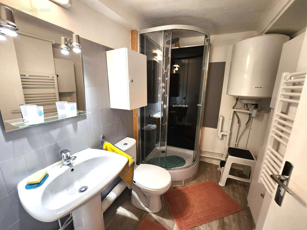Appt rénové au coeur du village - photo 11