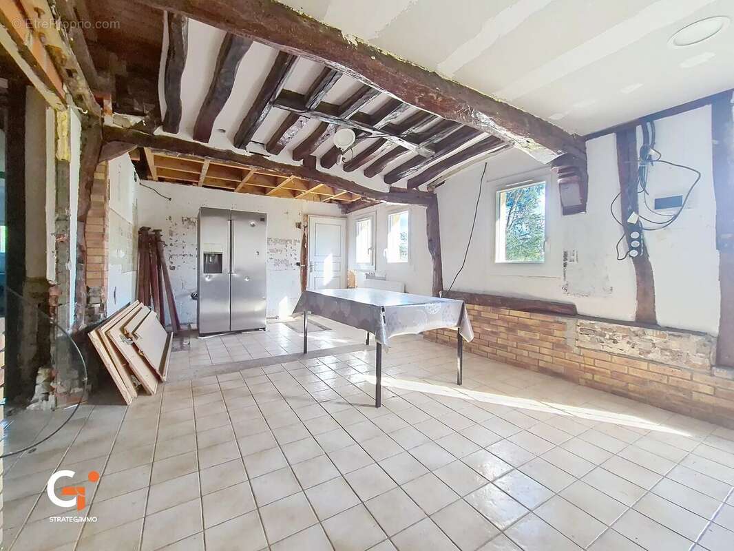 Maison à SAINT-OUEN-DE-THOUBERVILLE