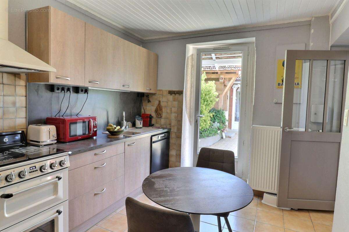 En exclusivité - maison dauphinoise avec joli terrain et dépendances a sainte-blandine (38110) - photo 6