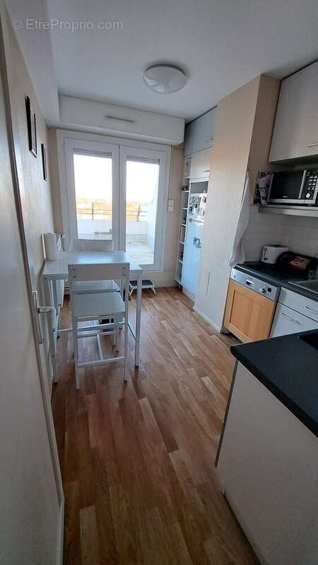cuisine aménagée  - Appartement à POITIERS
