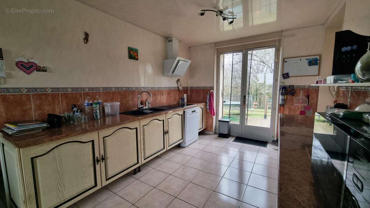 Maison à DOUVILLE