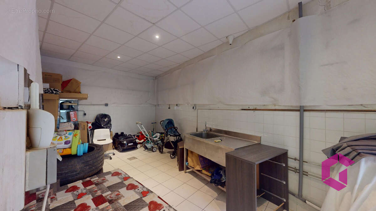Appartement et local commercial - photo 12