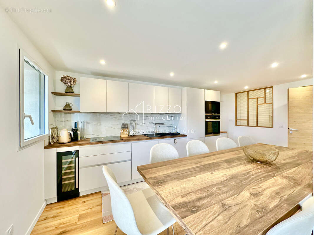 Appartement refait à neuf avec grande terrasse vue lac !!! - photo 10