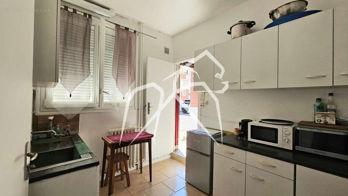 Immeuble de rapport 198 m²  Sotteville-lès-Rouen (76300) - photo 3