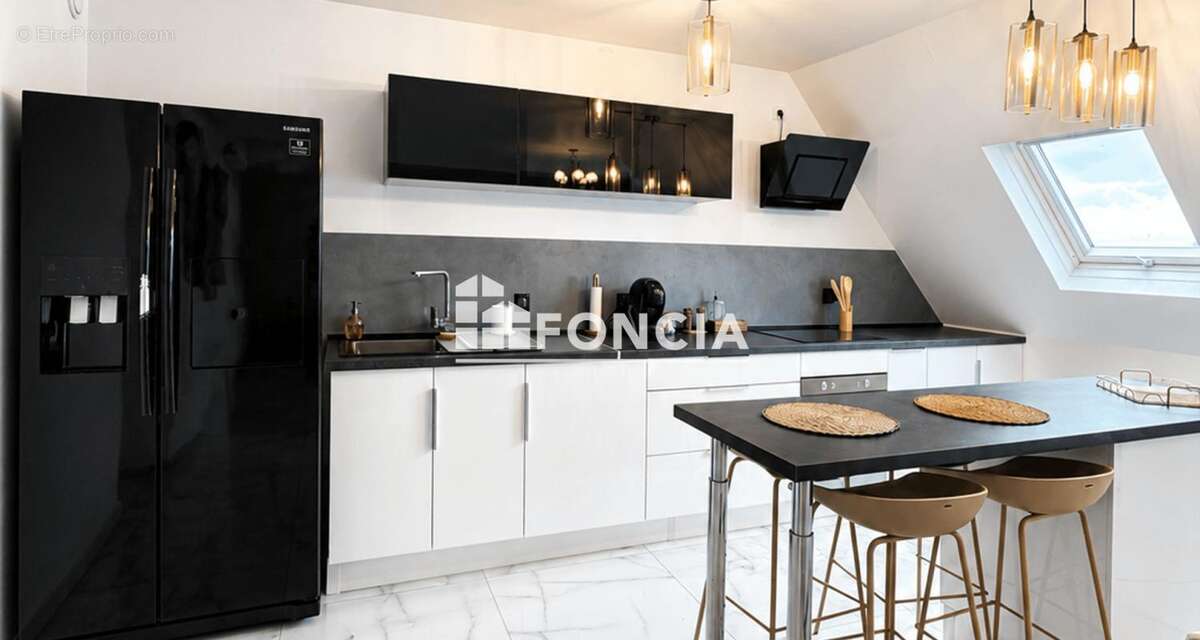 Appartement - t3 - 2 balcons -70m2- 60m2 carrez- cave - mundolsheim - photo 5