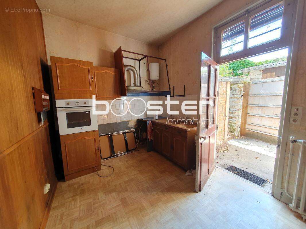 Immeuble de rapport à rénover avec potentiel, en cœur de ville - photo 12
