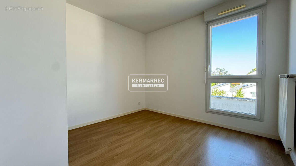VERTOU BEAUTOUR - Appartement T4 lumineux avec terrasse et 2 parkings en sous-sol - photo 7