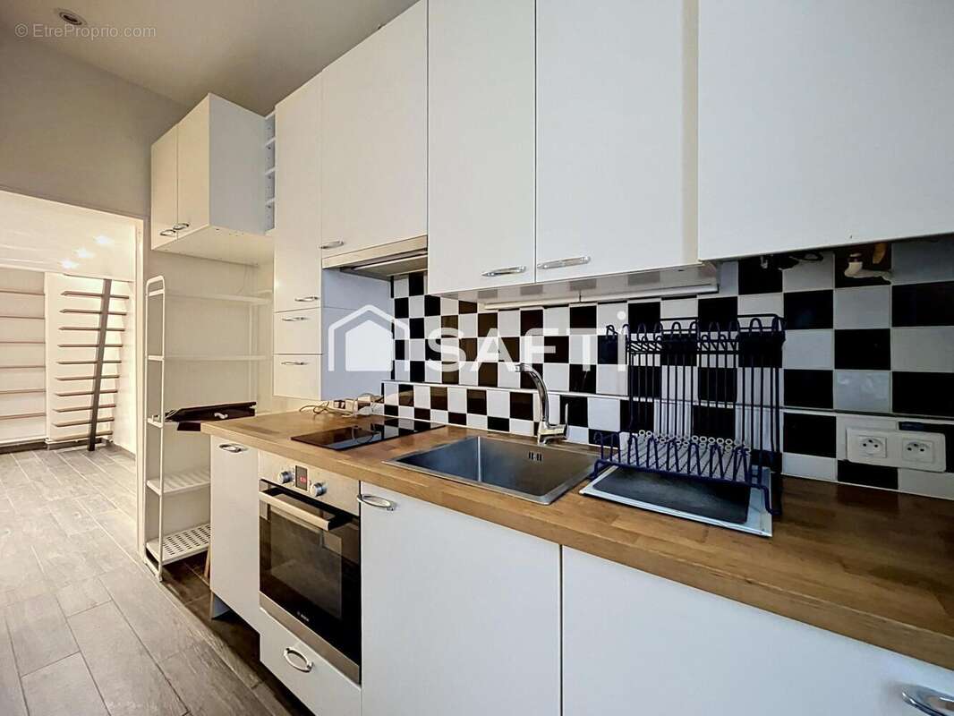 Photo 2 - Appartement à PARIS-18E